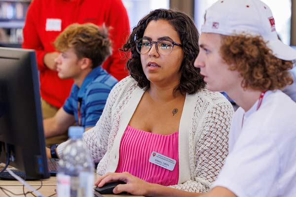 Advisor teaching student.